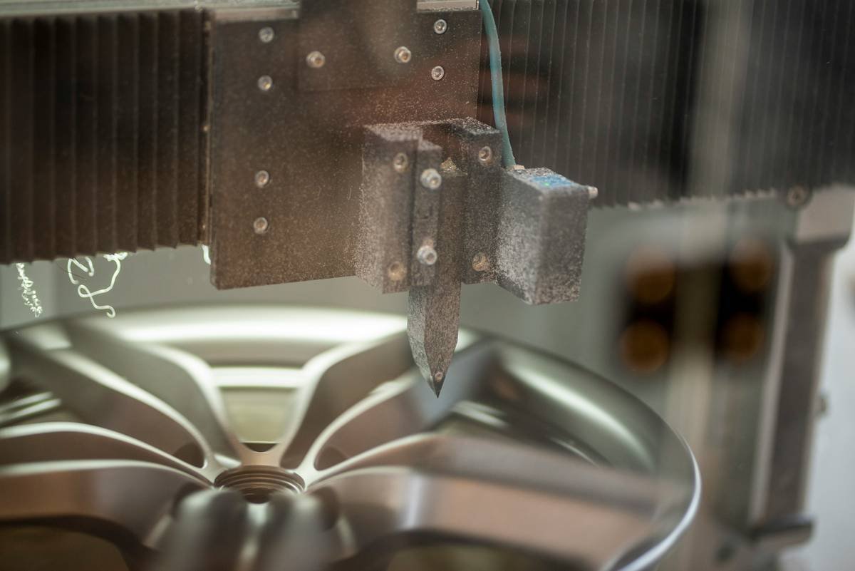 Side-by-side comparison of worn vs. new bread machine dough hook showing subtle warping and material fatigue
