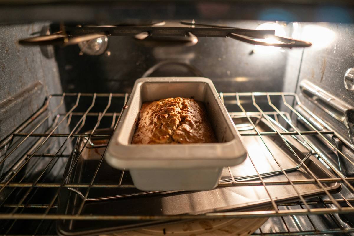 how to bake bread for beginners: step-by-step guide showing bread machine in use with ingredients nearby